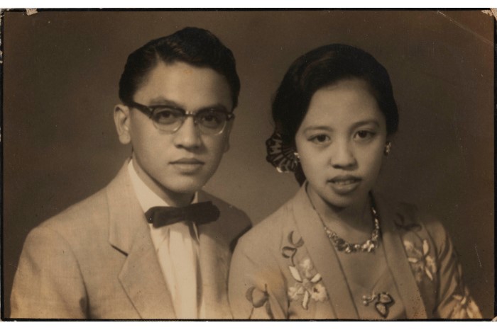 <p style="border: none;"><a href="/assets/050f5213-7eeb-432d-ae20-e5a1cd43e86e/Studio photo of Haji Ahmad Jamal and Hajjah Fatimah.jpg">Studio photo of Haji Ahmad Jamal bin Haij Mohd Hassan and Hajjah Fatimah binte Haji Mohd Alie who were married in Singapore in 1954 after Hajjah Fatimah travelled from Jakarta to Singapore via a Koninklijke Paketvaart-Maatschappij (KPM) steamship</a>